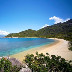 Private beach, white sand, beach umbrellas, scuba diving