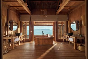 The Rock Retreat | Bathroom | Separate tub and shower, designer toiletries, hair dryer, bathrobes
