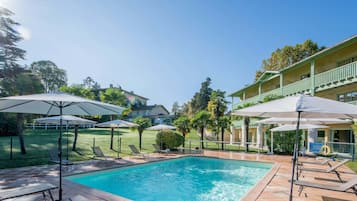 Indoor pool, seasonal outdoor pool, open 10 AM to 9 PM, pool loungers