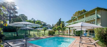 Indoor pool, seasonal outdoor pool, open 10 AM to 9 PM, sun loungers