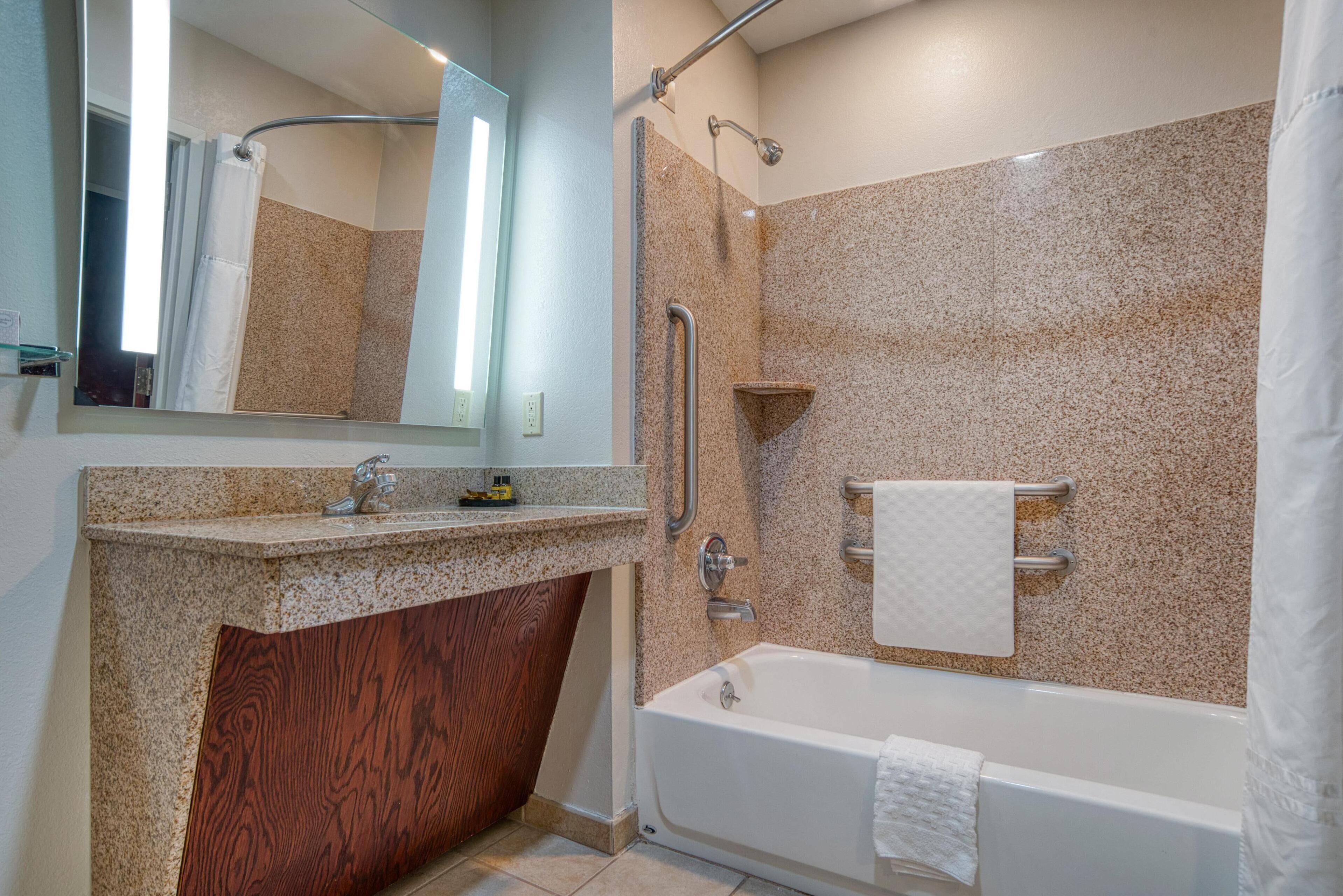 suite, 2 queen beds, accessible, bathtub | bathroom | combined shower/bathtub, hair dryer, towels