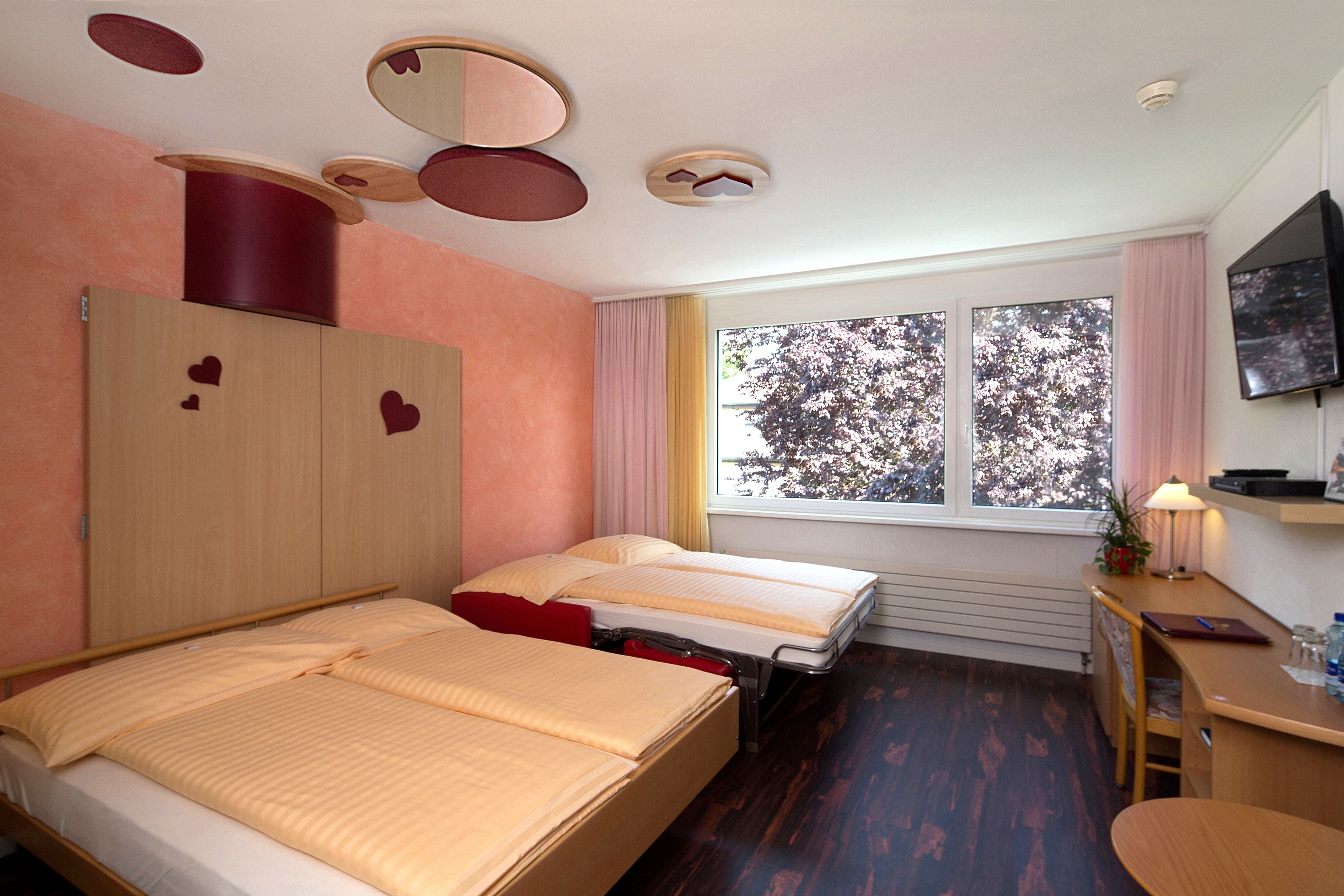 family room | 1 bedroom, premium bedding, in-room safe, desk