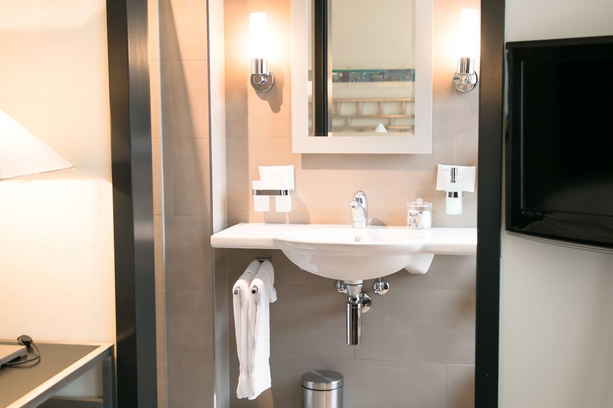 comfort double room | bathroom | shower, hair dryer, towels, soap