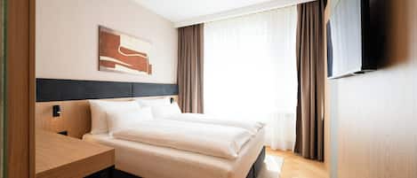 Habitación Business, 1 cama de matrimonio | Minibar, escritorio, espacio para trabajar con un portátil