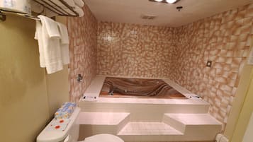 Suite, 1 King Bed, Non Smoking, Jetted Tub | Deep soaking bathtub