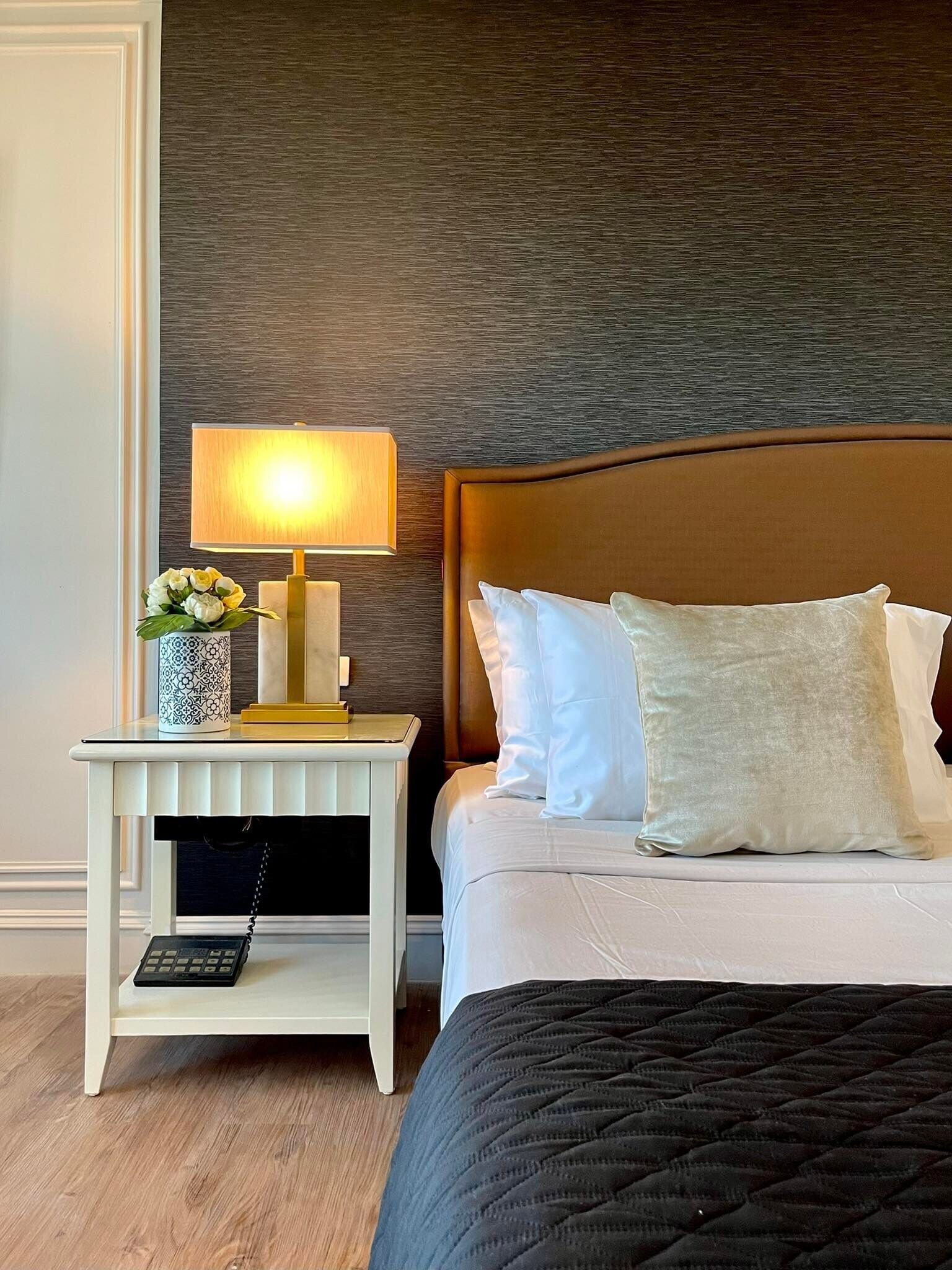 deluxe room | minibar, in-room safe, desk, blackout curtains