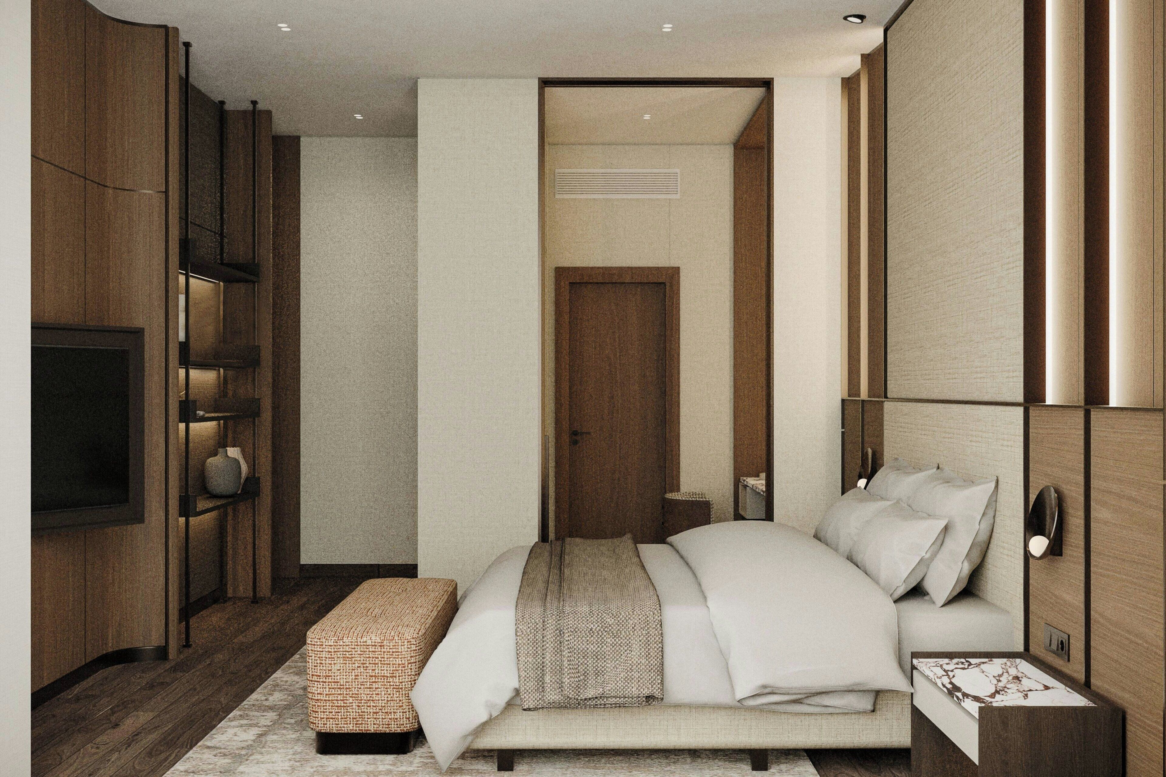 أغطية فراش متميزة وميني بار وخزنة داخل الغرفة ومكتب