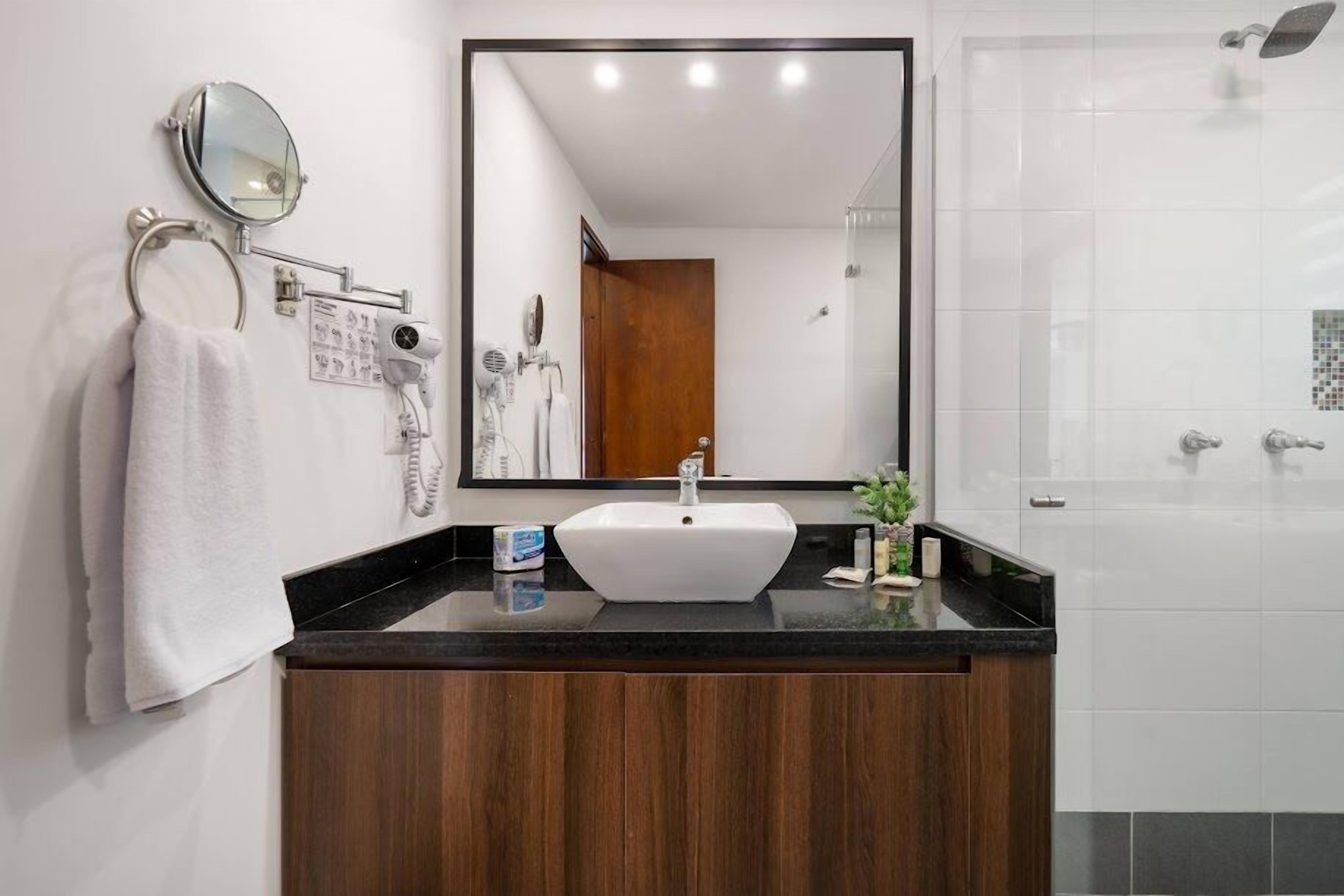 superior suite | bathroom | shower, rainfall showerhead, free toiletries, hair dryer