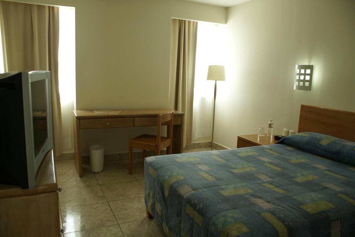 Blackout drapes, WiFi (free), bed sheets