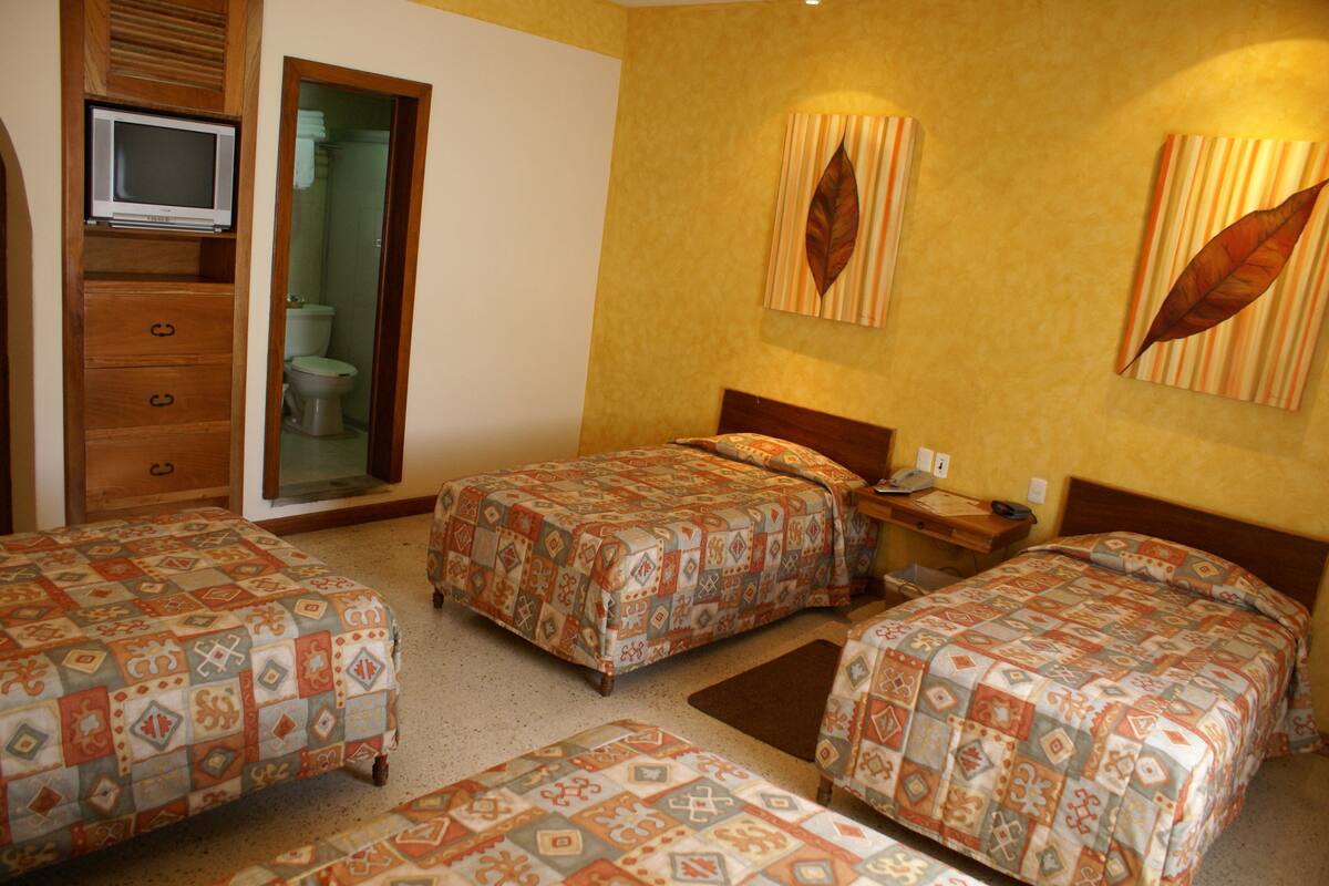 Basic Quadruple Room | Blackout drapes, WiFi (free), bed sheets