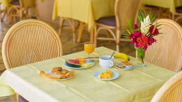 Breakfast, lunch, dinner served; local cuisine
