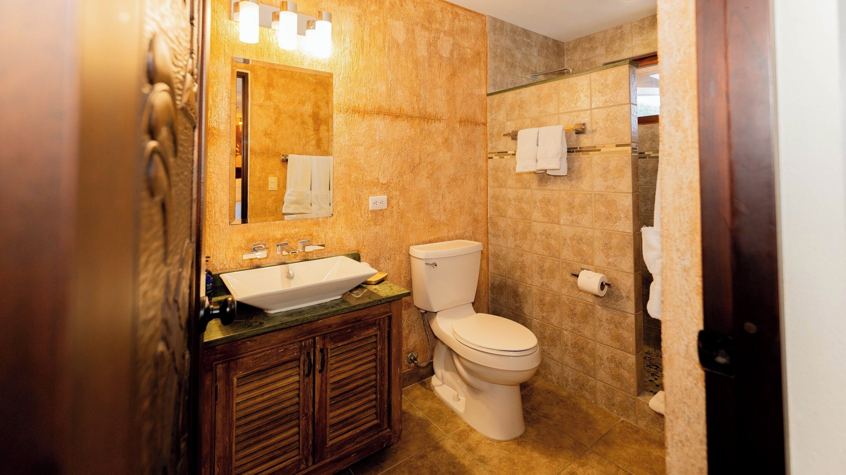 family junior suite | bathroom | shower, rainfall showerhead, designer toiletries, hair dryer