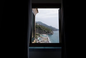 Habitación familiar | Colchones Select Comfort, minibar, caja fuerte y escritorio