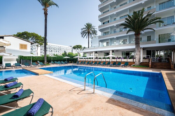Outdoor pool, pool umbrellas, pool loungers