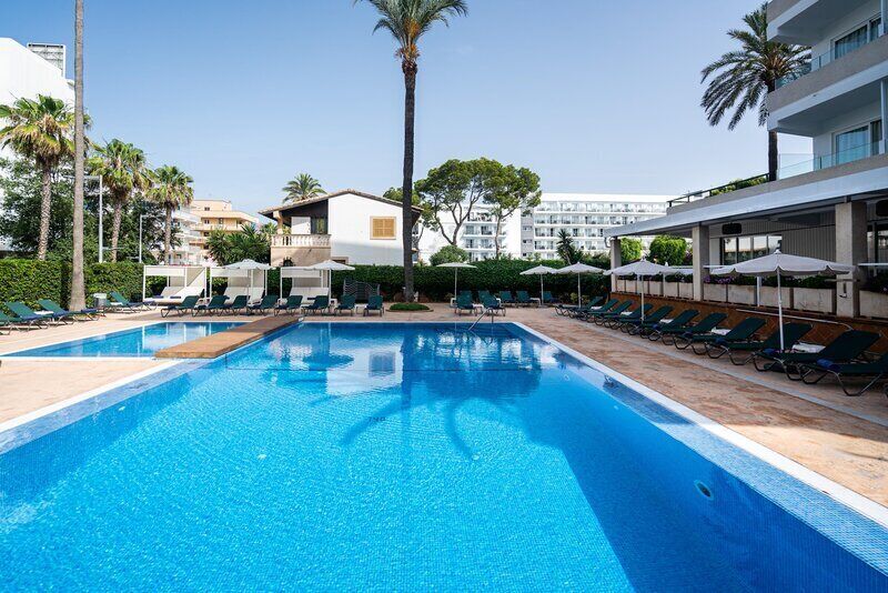 Outdoor pool, pool umbrellas, pool loungers