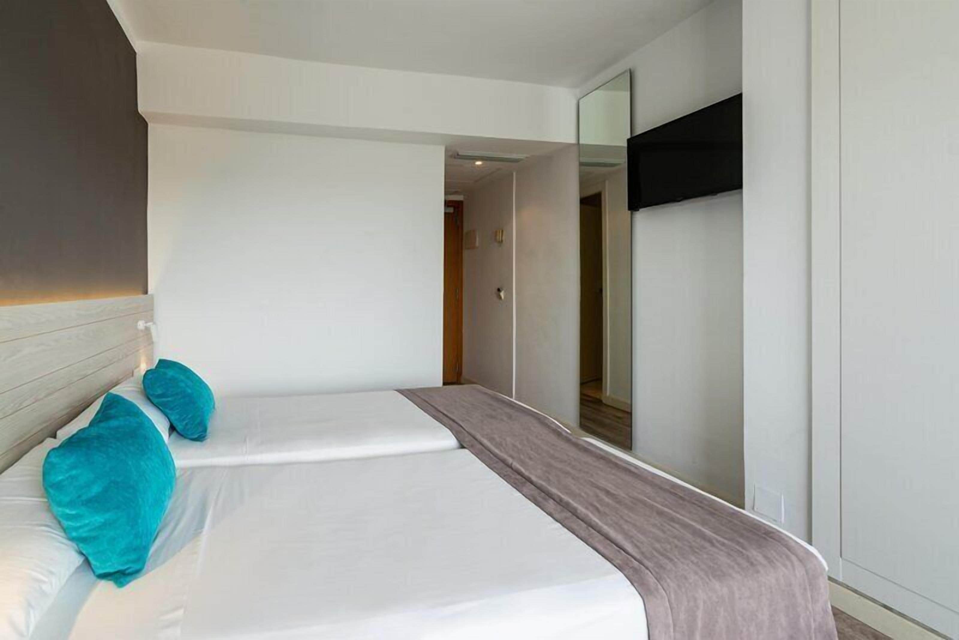 Desk, blackout curtains, free WiFi, bed sheets