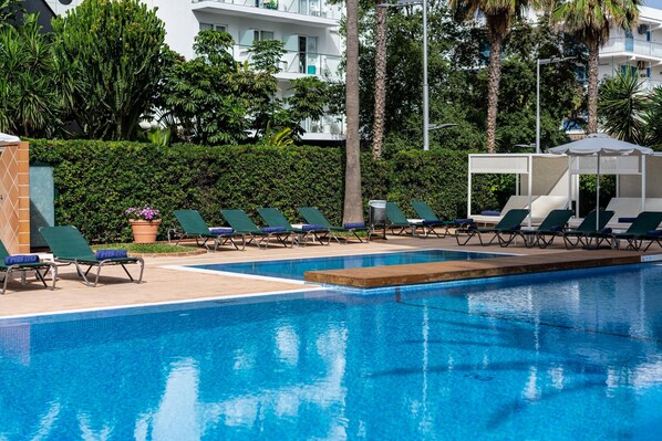 Outdoor pool, pool umbrellas, pool loungers