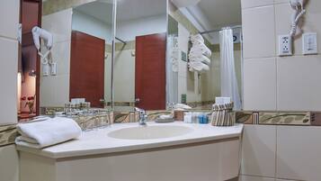 Shower, rainfall showerhead, hair dryer, towels