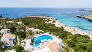 2 outdoor pools, pool umbrellas, pool loungers