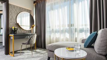 Panoramic One-bedroom Suite High Floor | Living area | 55-inch flat-screen TV with satellite channels, TV, Netflix