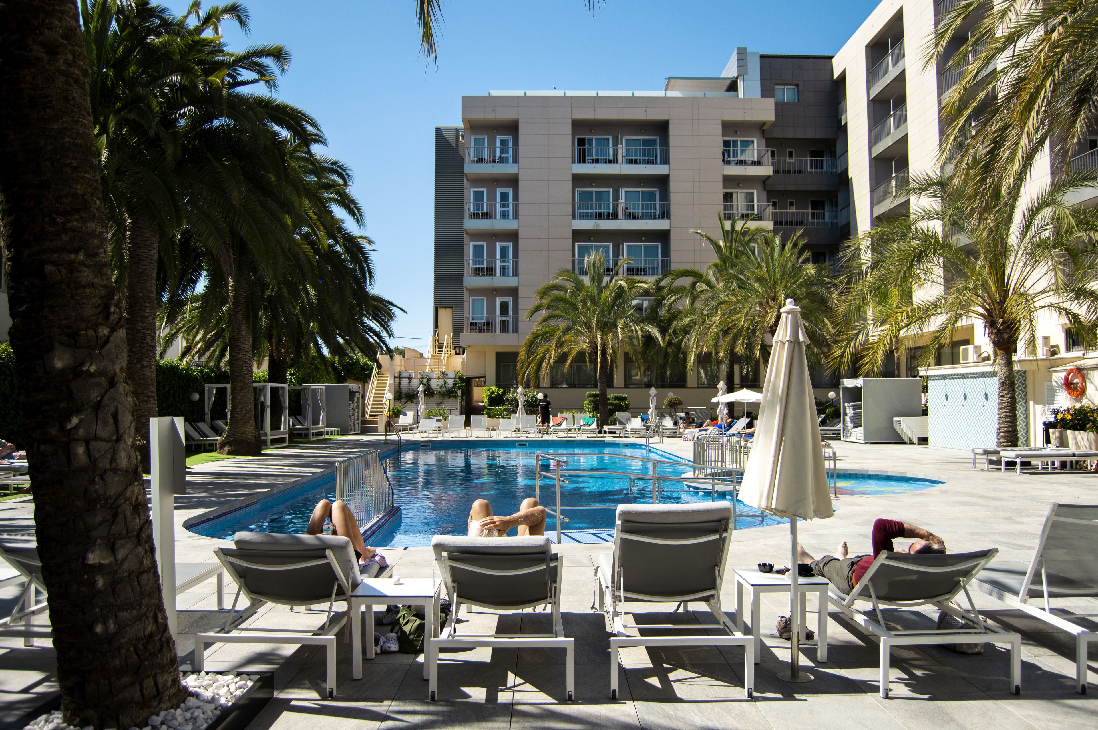 indoor pool, 2 outdoor pools, open 10:00 am to 7:00 pm, pool umbrellas