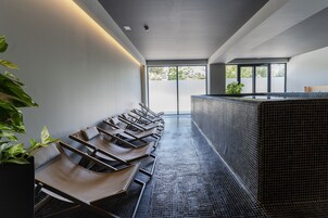 Indoor pool, 2 outdoor pools, open 10:00 AM to 7:00 PM, pool umbrellas