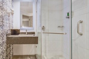 Shower, eco-friendly toiletries, hair dryer, towels