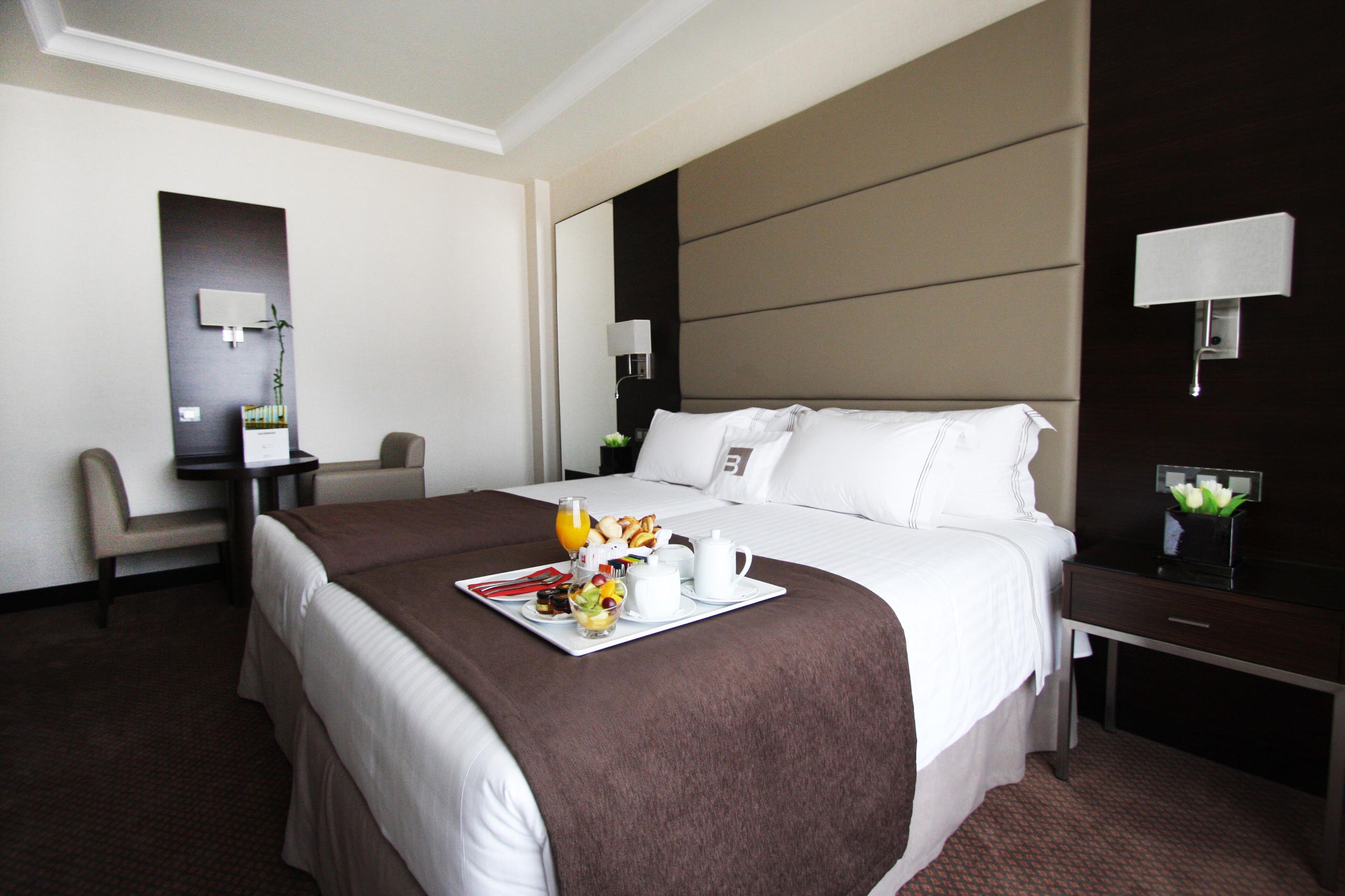 Premium bedding, memory-foam beds, minibar, in-room safe