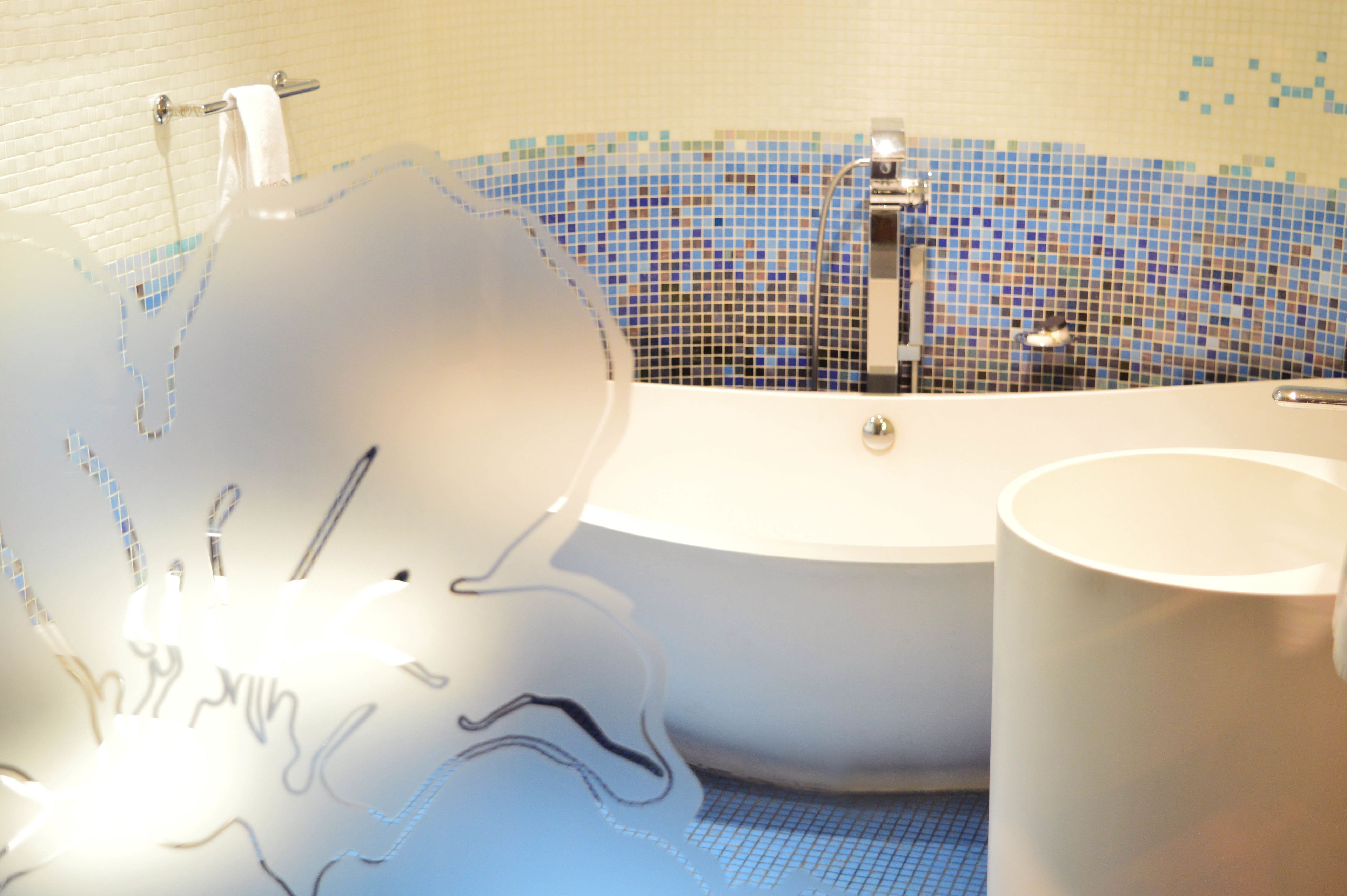 rainfall showerhead, designer toiletries, hair dryer, bathrobes