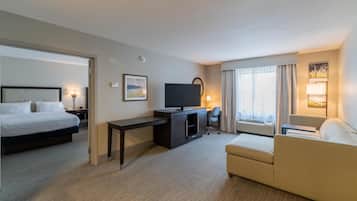 Suite, Two Queen Beds | Living area | 32-inch flat-screen TV with cable channels, TV