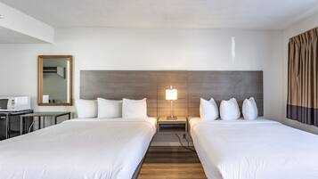 Standard-huone, 2 keskisuurta parisänkyä | Silitysrauta/-lauta, ilmainen Wi-Fi, vuodevaatteet