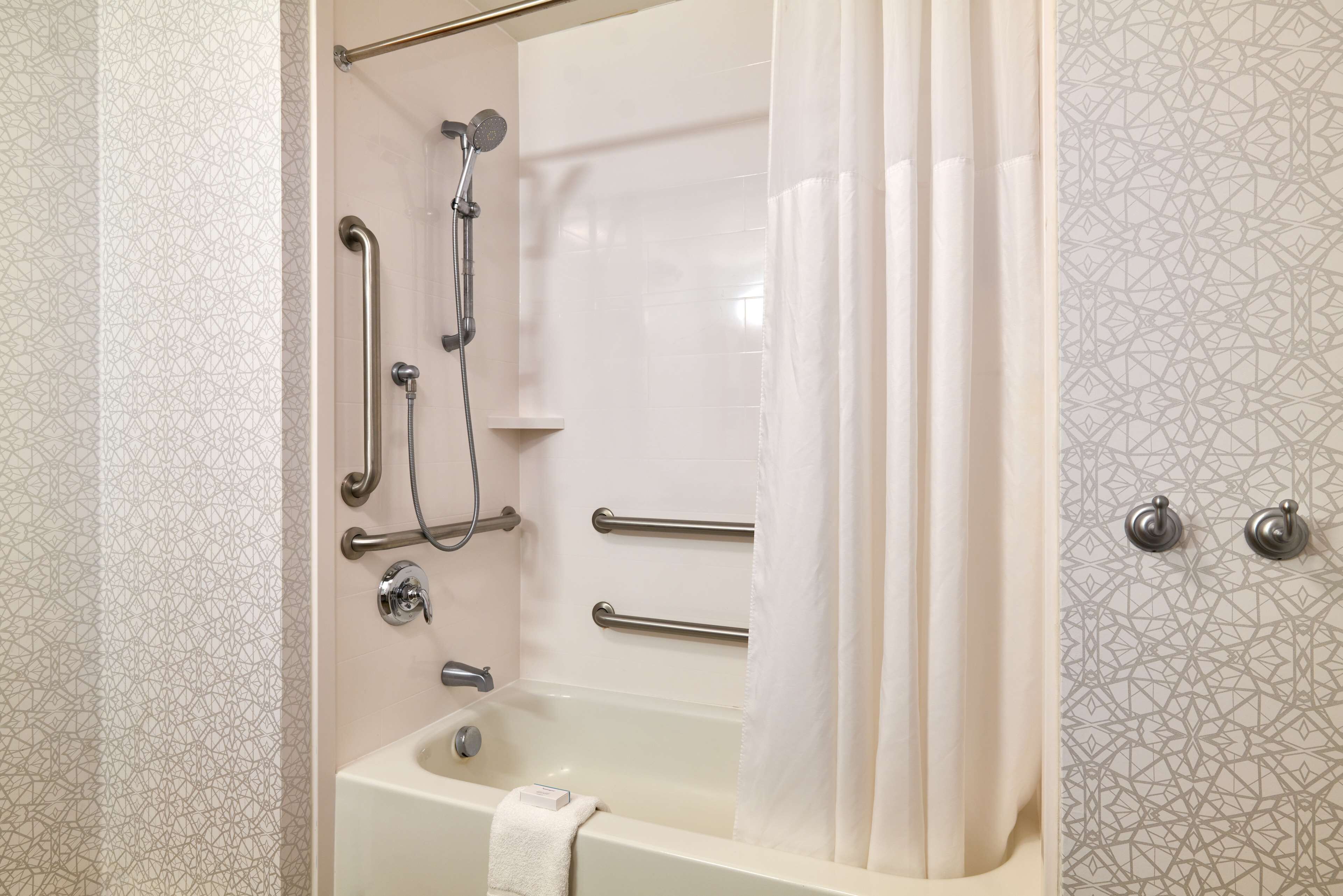 combined shower/bathtub, free toiletries, hair dryer, towels