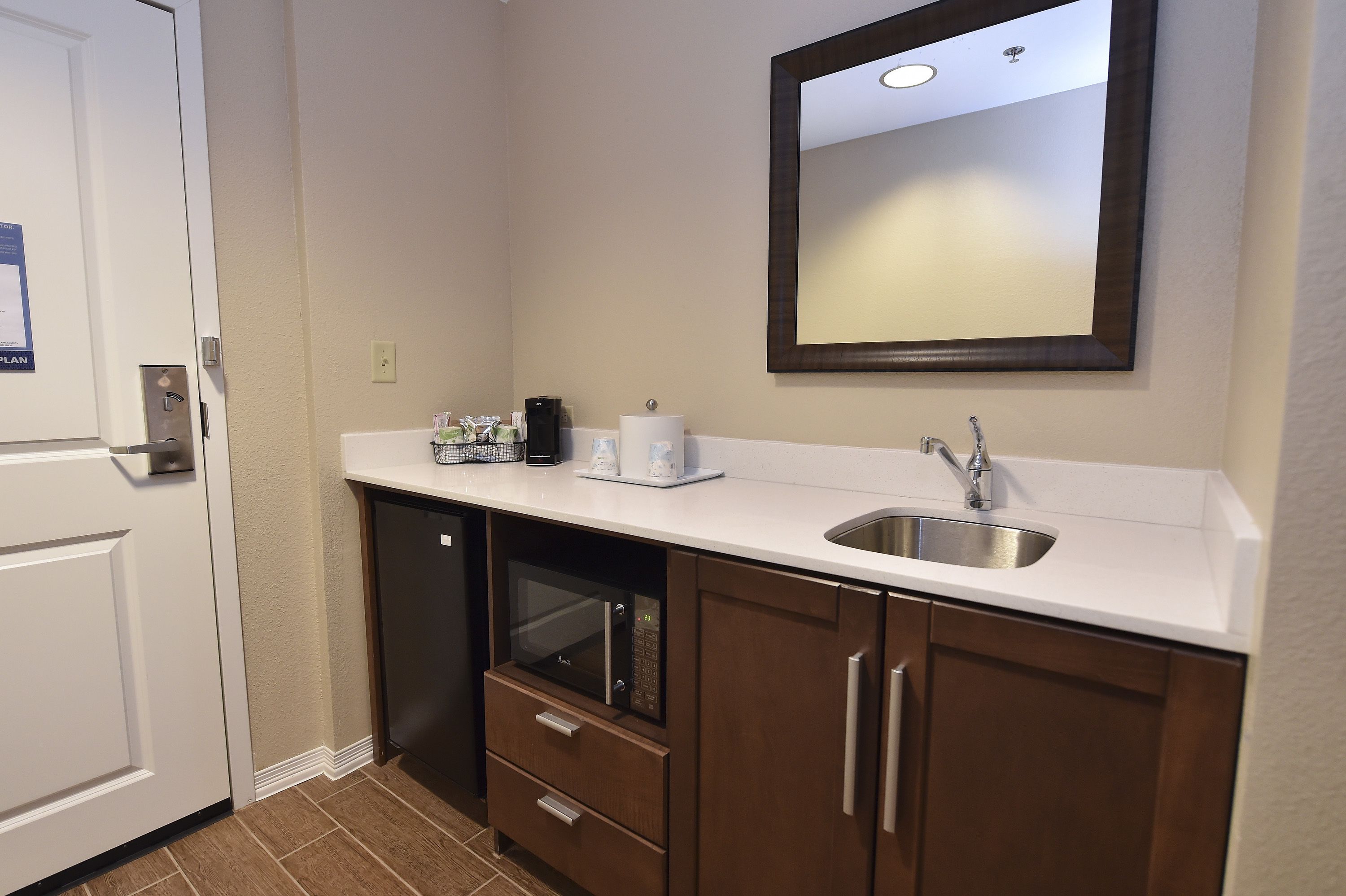 suite, 2 queen beds, non smoking | in-room safe, desk, iron/ironing board, free cots/infant beds