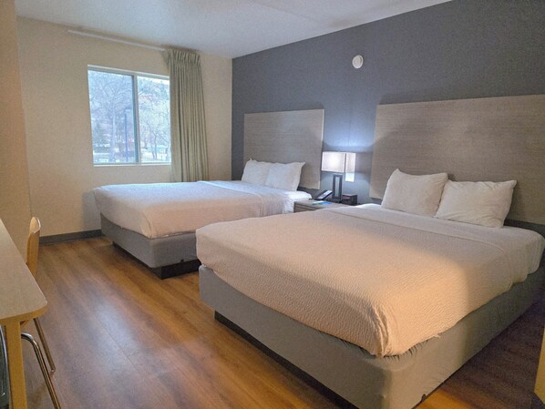 Standard Room, 2 Queen Beds, Non Smoking | Individually decorated, free WiFi, bed sheets, alarm clocks