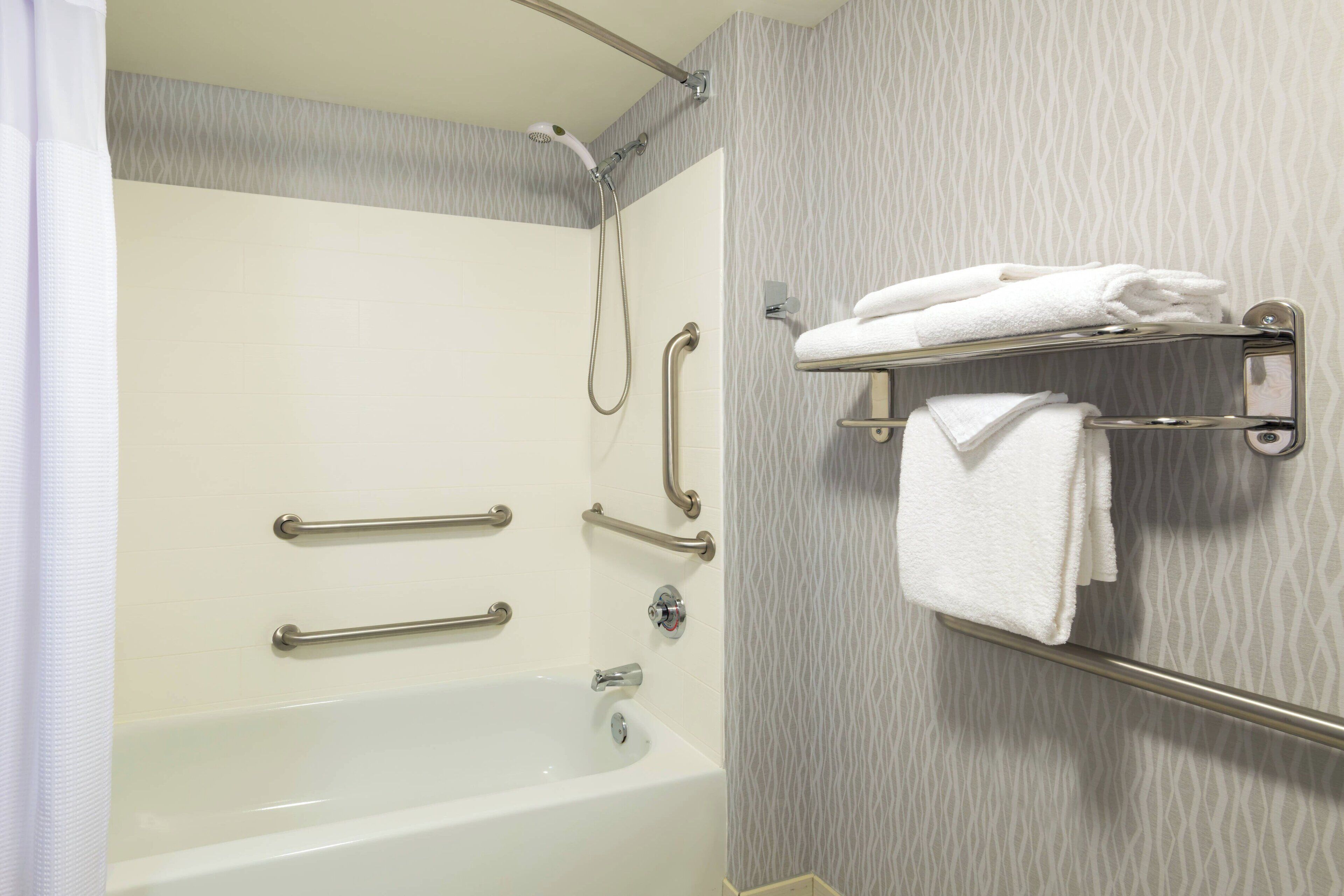 suite, 2 queen beds, non smoking | bathroom | combined shower/bathtub, free toiletries, hair dryer, towels