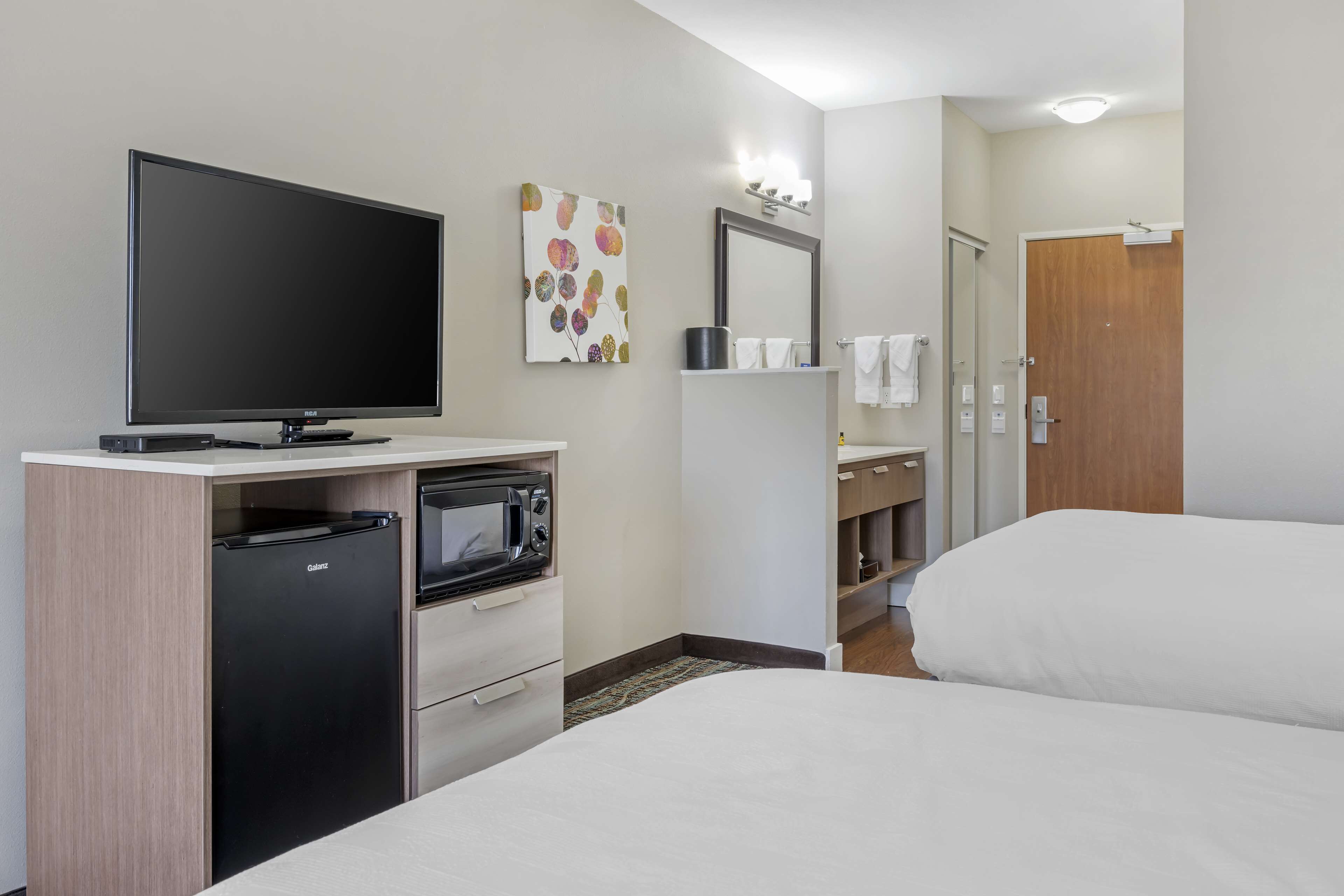 standard room, 2 queen beds, non smoking, refrigerator & microwave | desk, laptop workspace, iron/ironing board, free wifi