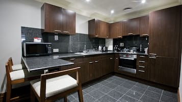 Luxury Apartment, 2 Bedrooms | Private kitchen | Fridge, microwave, oven, stovetop
