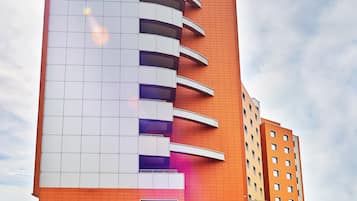 Guests can enjoy outdoor space from their balconies and relax in designated seating areas.