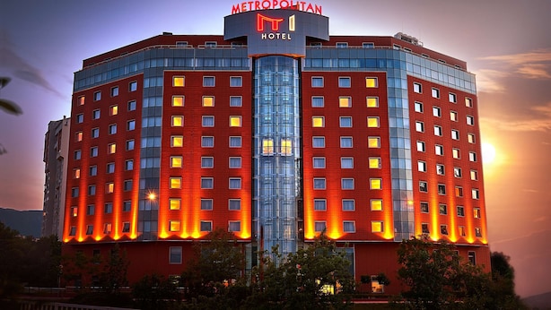 A hotel with a modern design, featuring a prominent 'METROPOLITAN' sign at the top. - Metropolitan Hotel Sofia, a member of Radisson Individuals (Sofia)