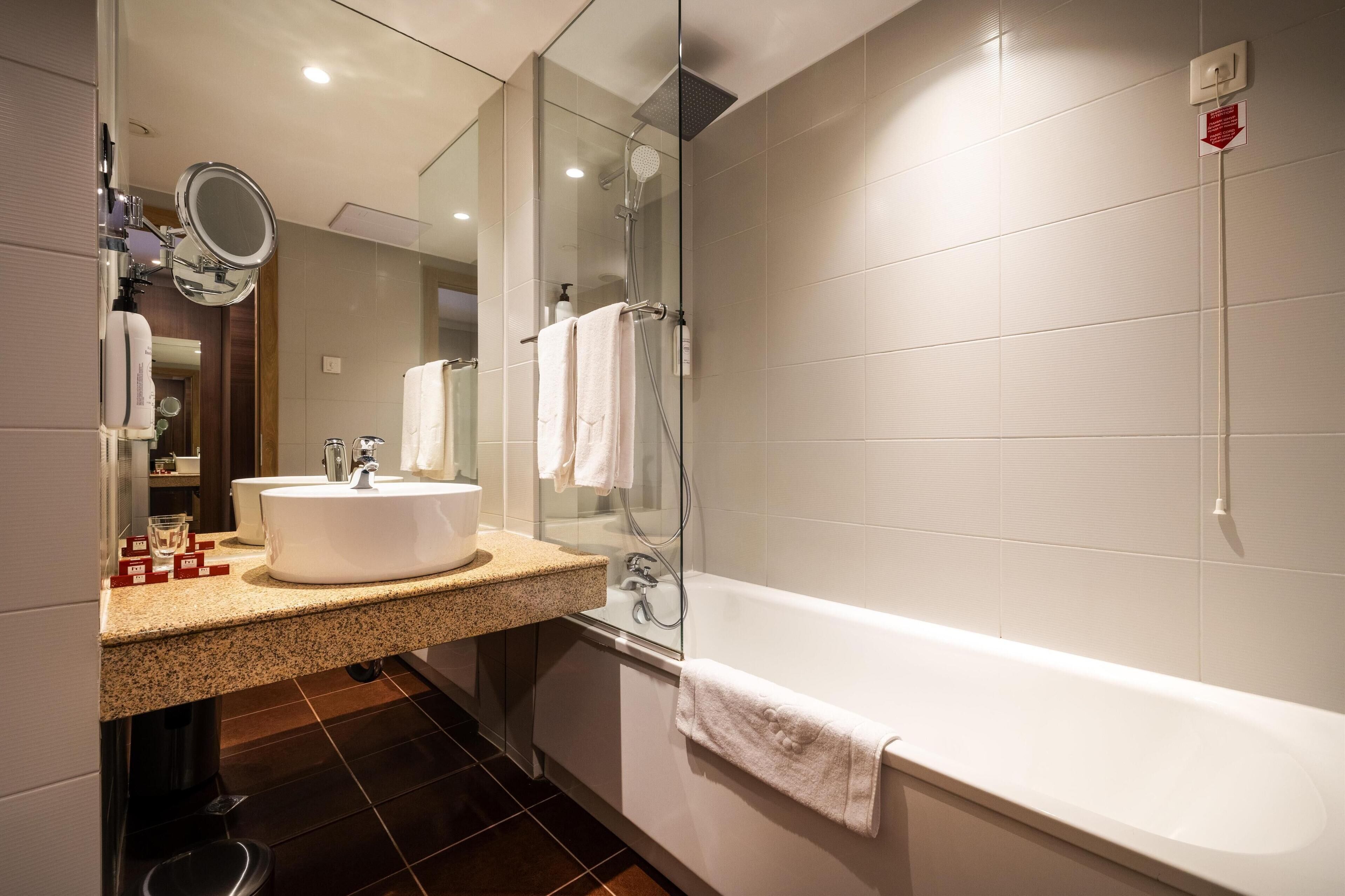 combined shower/bathtub, free toiletries, hair dryer, bathrobes