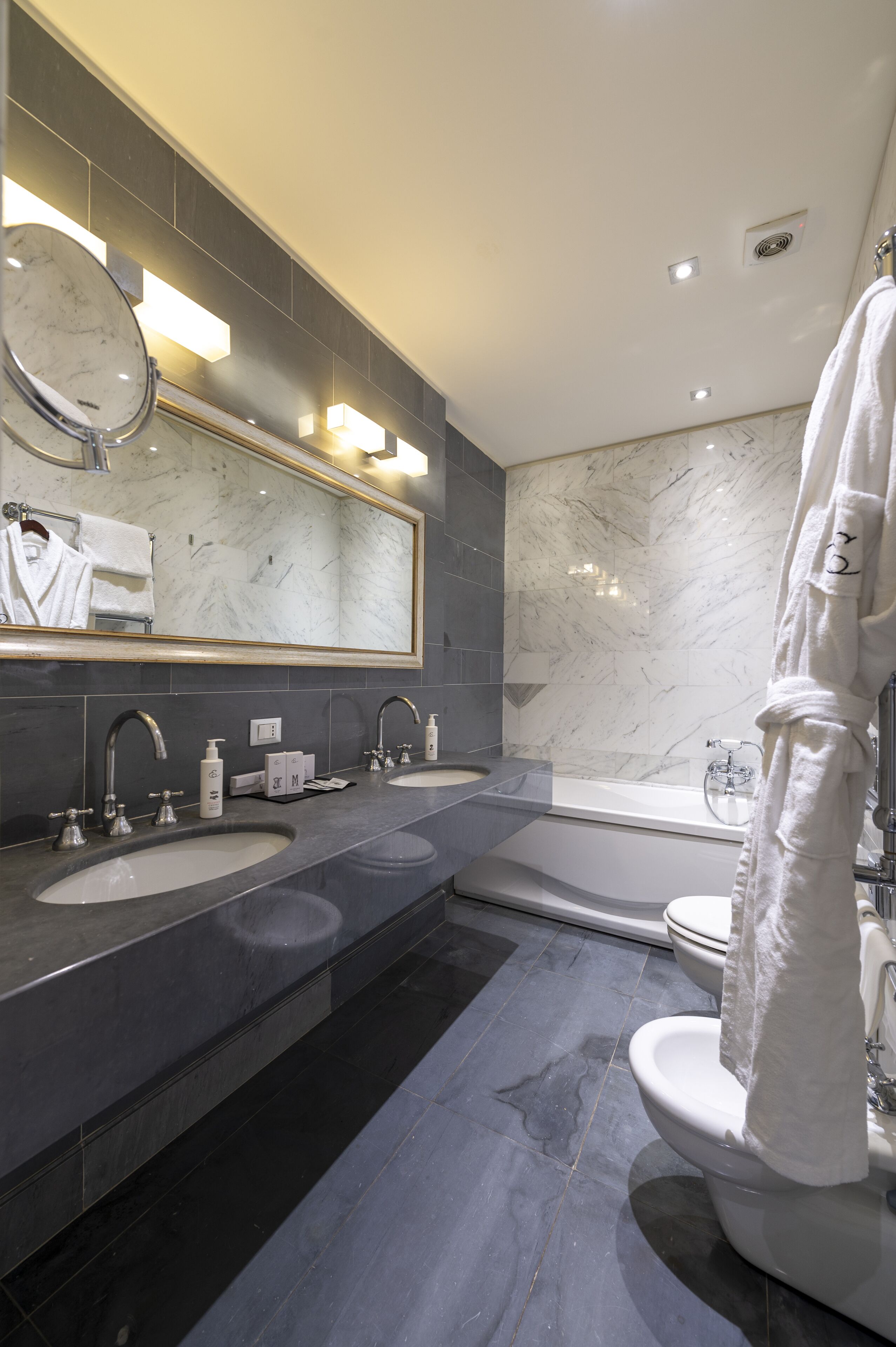 free toiletries, hair dryer, bidet, towels