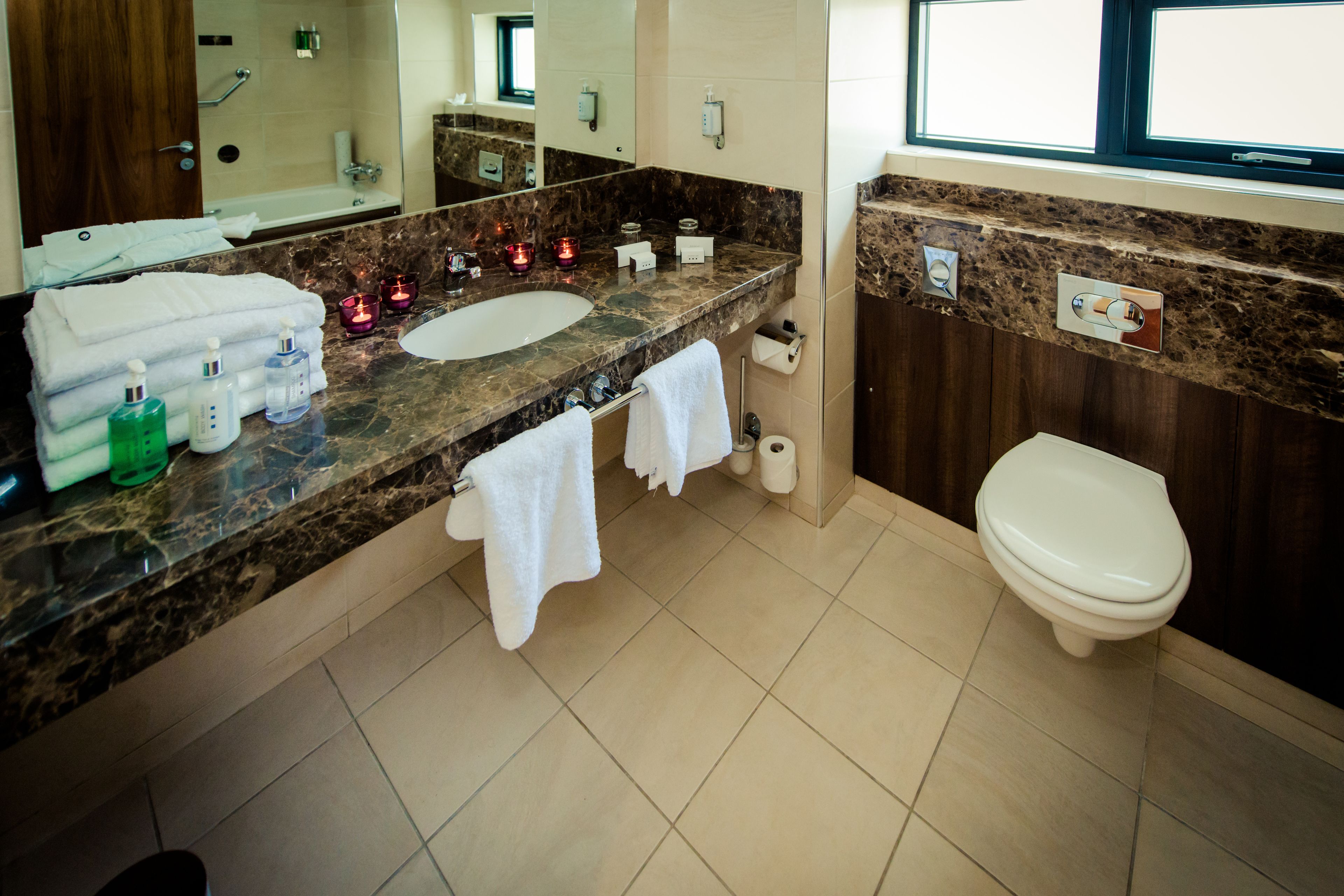 combined shower/bathtub, free toiletries, hair dryer, towels