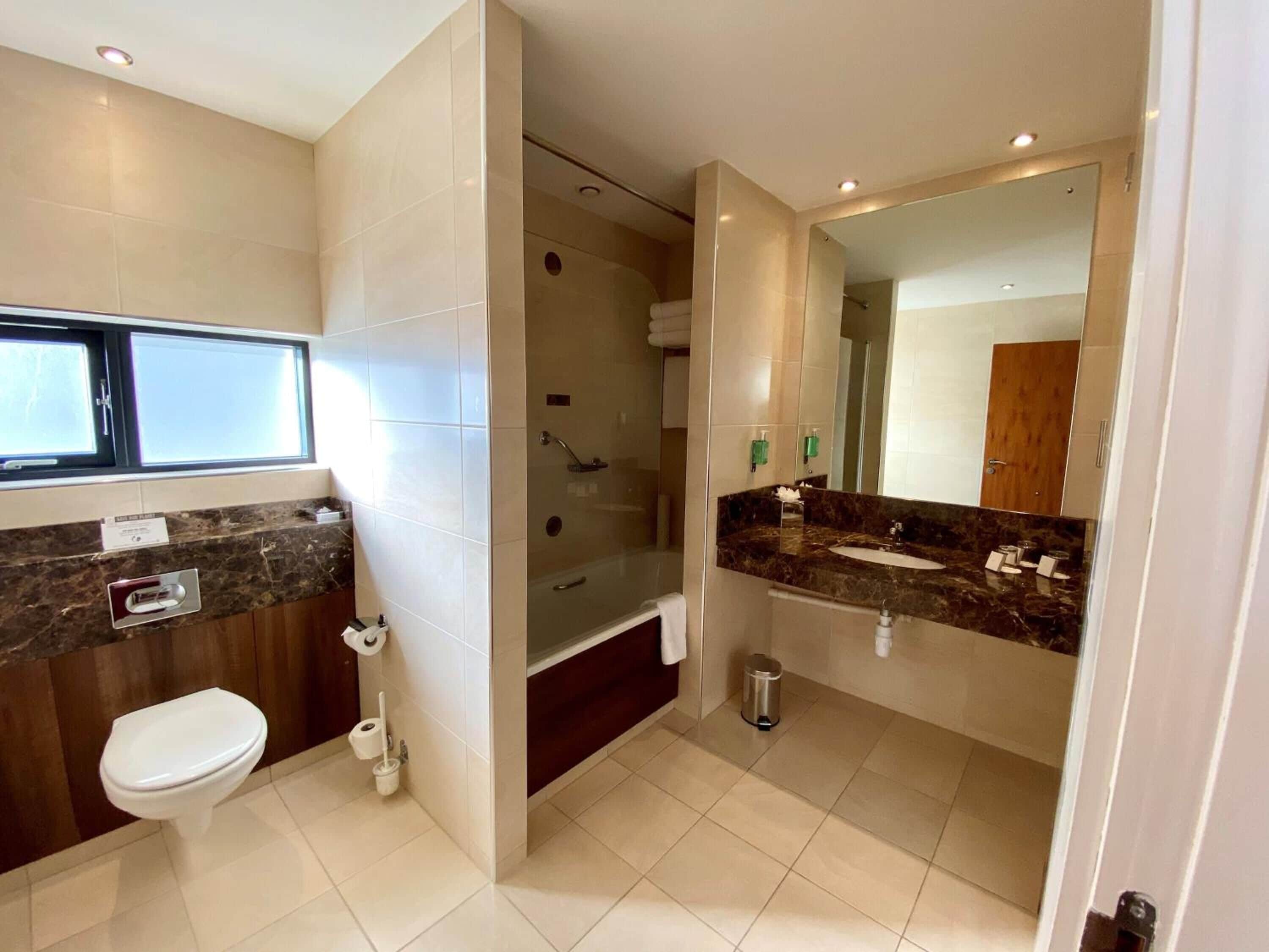 combined shower/bathtub, free toiletries, hair dryer, towels