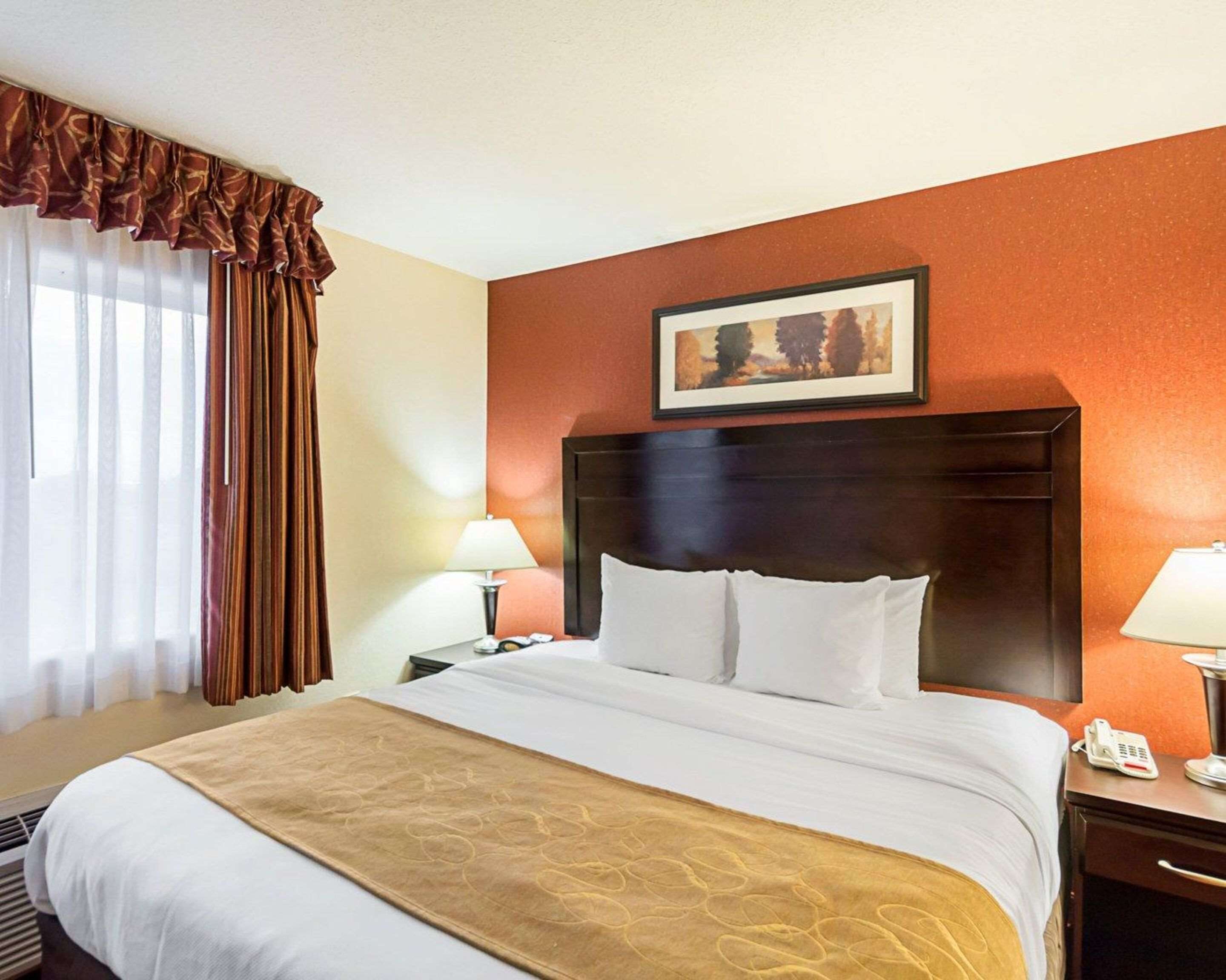 desk, blackout curtains, iron/ironing board, bed sheets