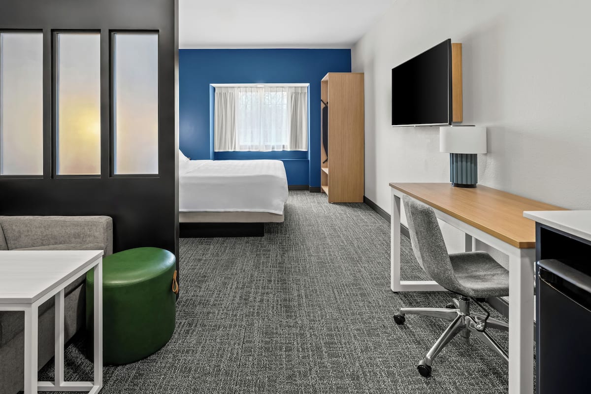 Desk, laptop workspace, blackout curtains, iron/ironing board