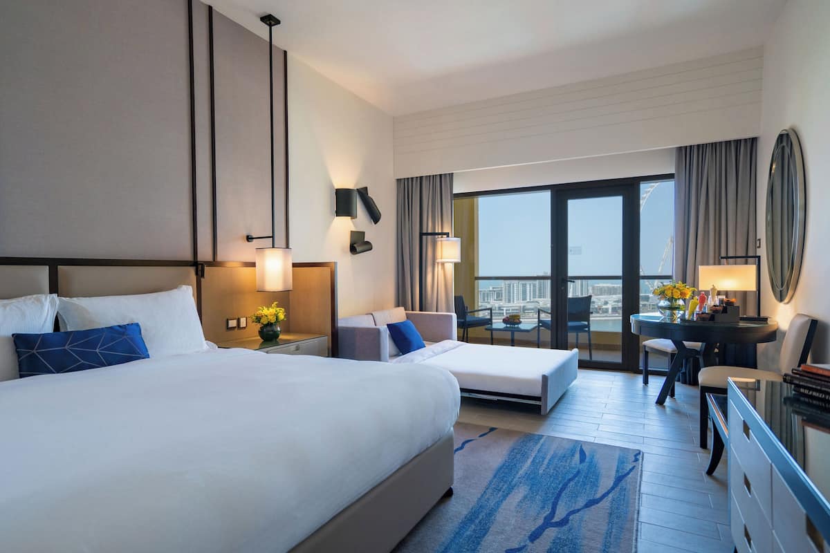 Family Room, 1 King Bed, Balcony (Sea Front View) | Down duvets, pillow-top beds, minibar, in-room safe