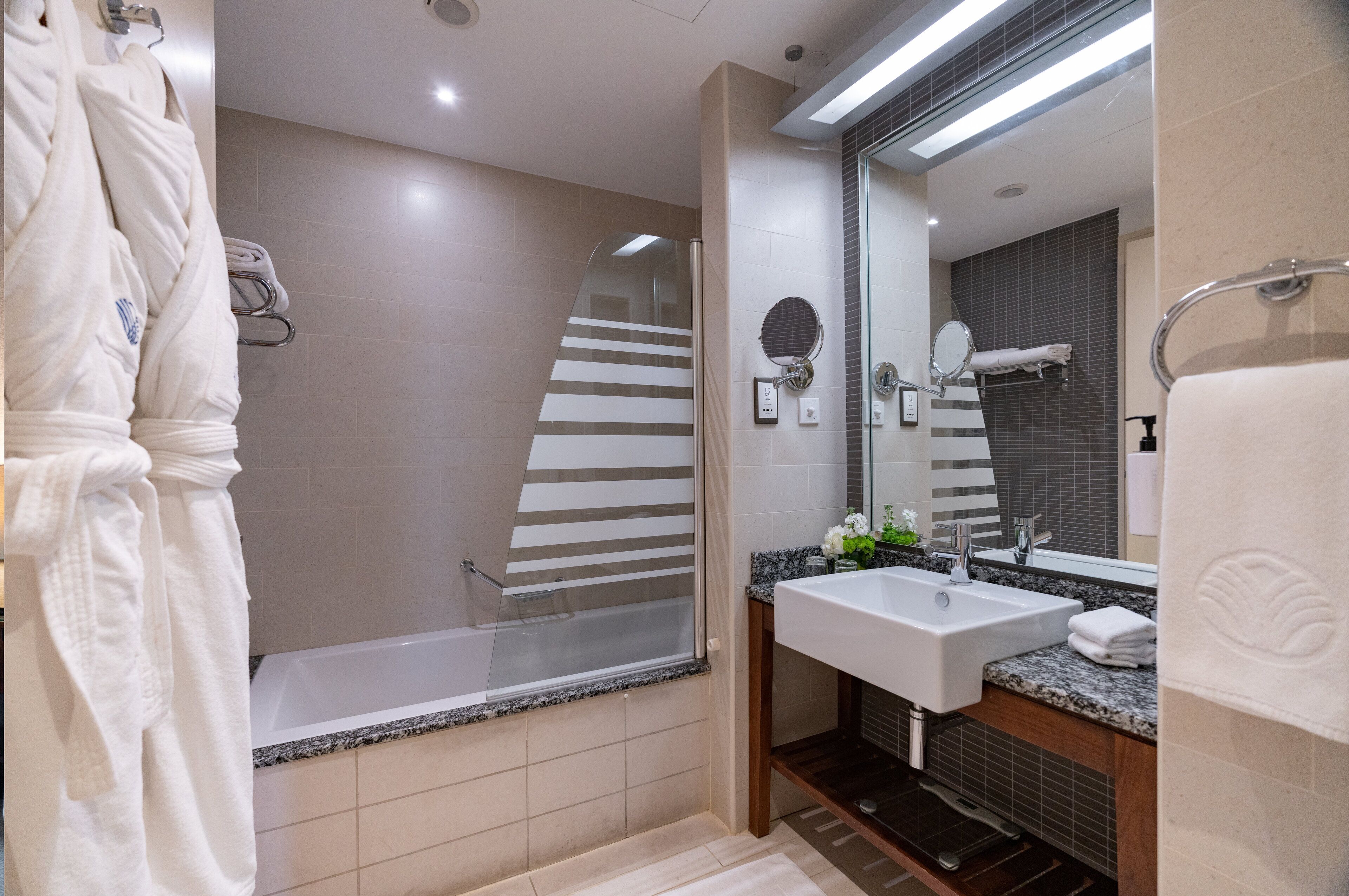 Room, 1 King Bed, Balcony (Sea Front View) | Bathroom | Combined shower/tub, designer toiletries, hair dryer, bathrobes