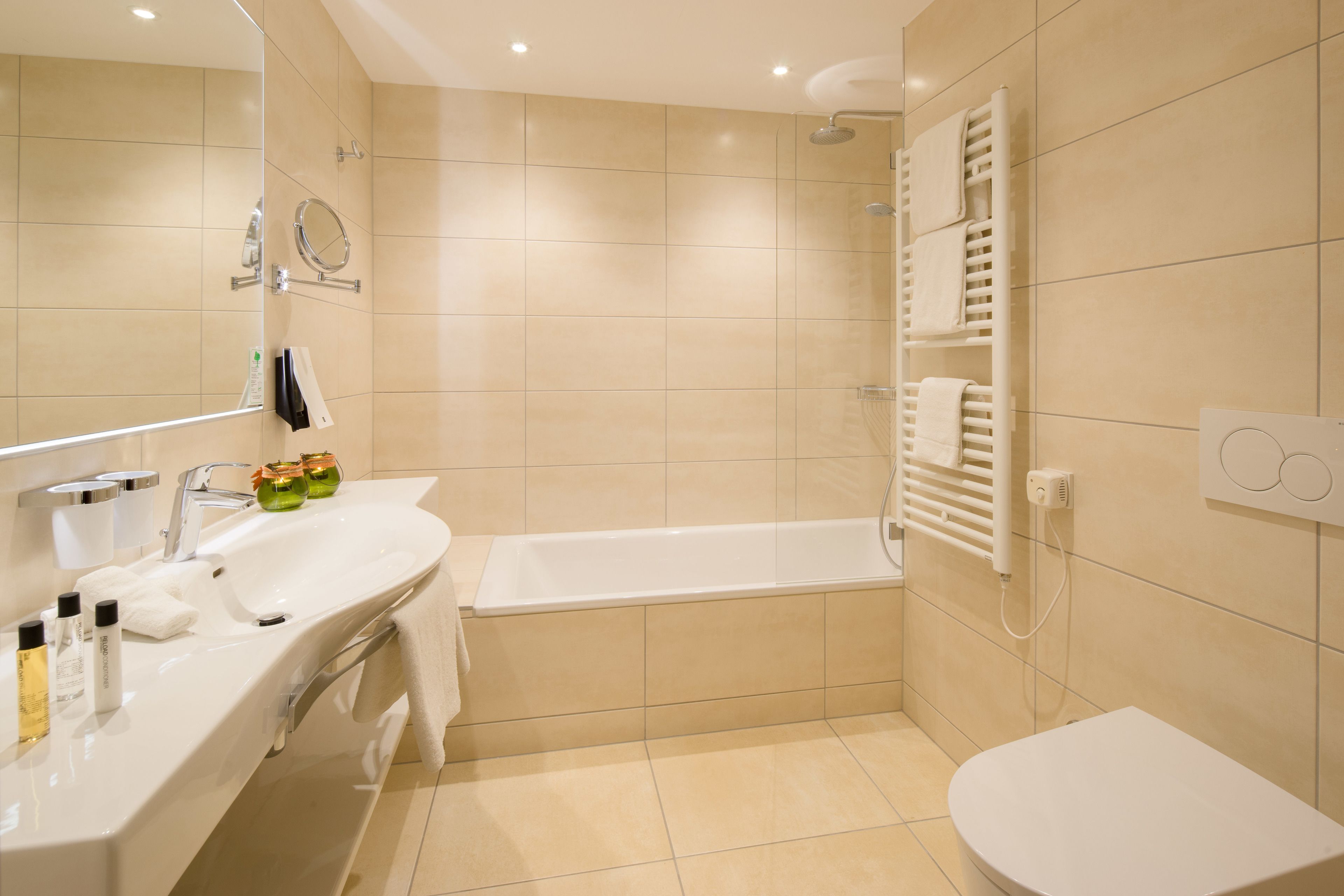 hair dryer, towels, soap, shampoo