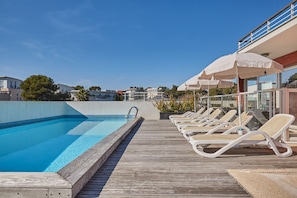 Seasonal outdoor pool, sun loungers