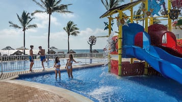 Relax by the pool surrounded by palm trees and enjoy a refreshing swim or a thrilling ride down the water slide.